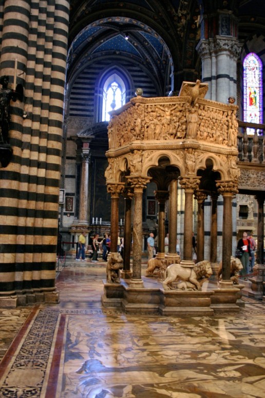Nicola Pisano's pulpit sculpted from Carraran marble