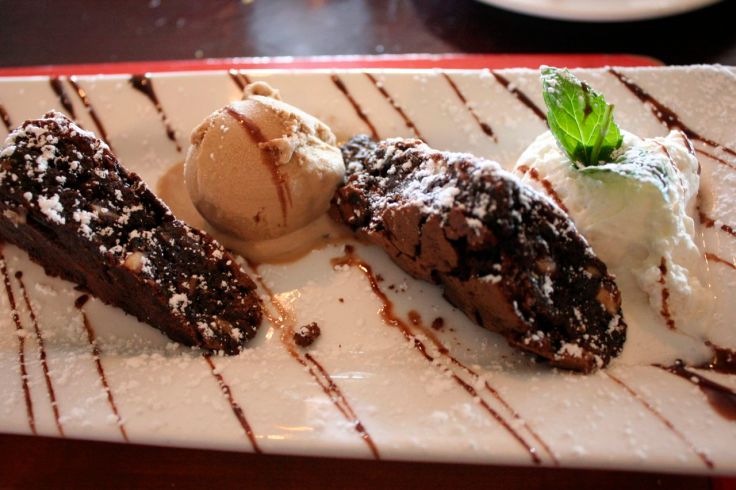 Hazelnut-chocolate brownie, cappuccino gelato and whipped cream