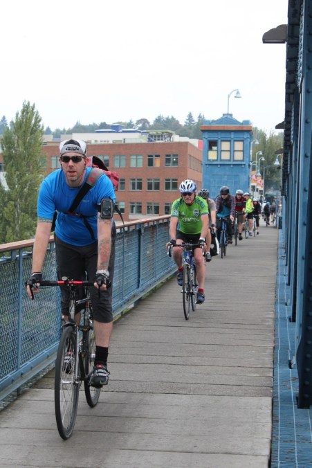 Bicyclists crossing after closing the bridge