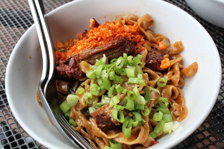 Dandan noodles, smoked pulled pork, peanuts