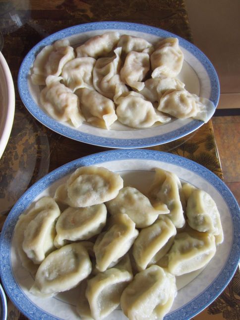 Cabbage pork dumplings (top), leek and fish dumplings (bottom)