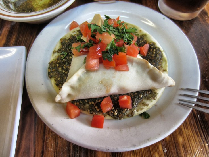Spinach and manakish pies (part of the vegetarian mezza)
